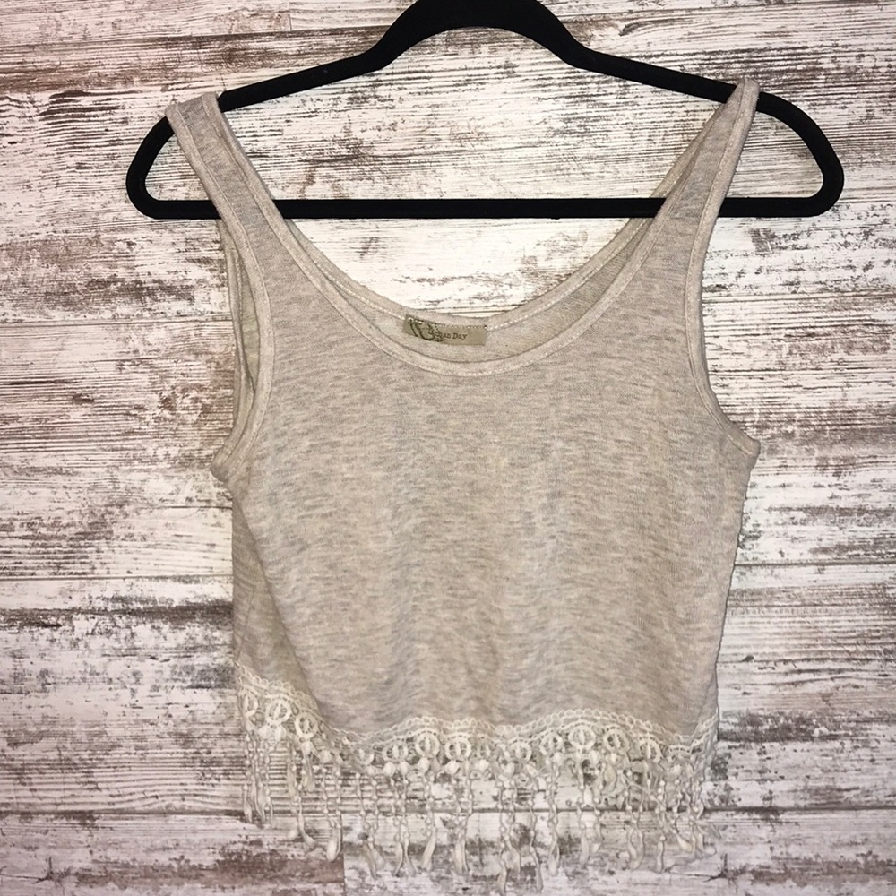 Beige cropped tank top with fringe